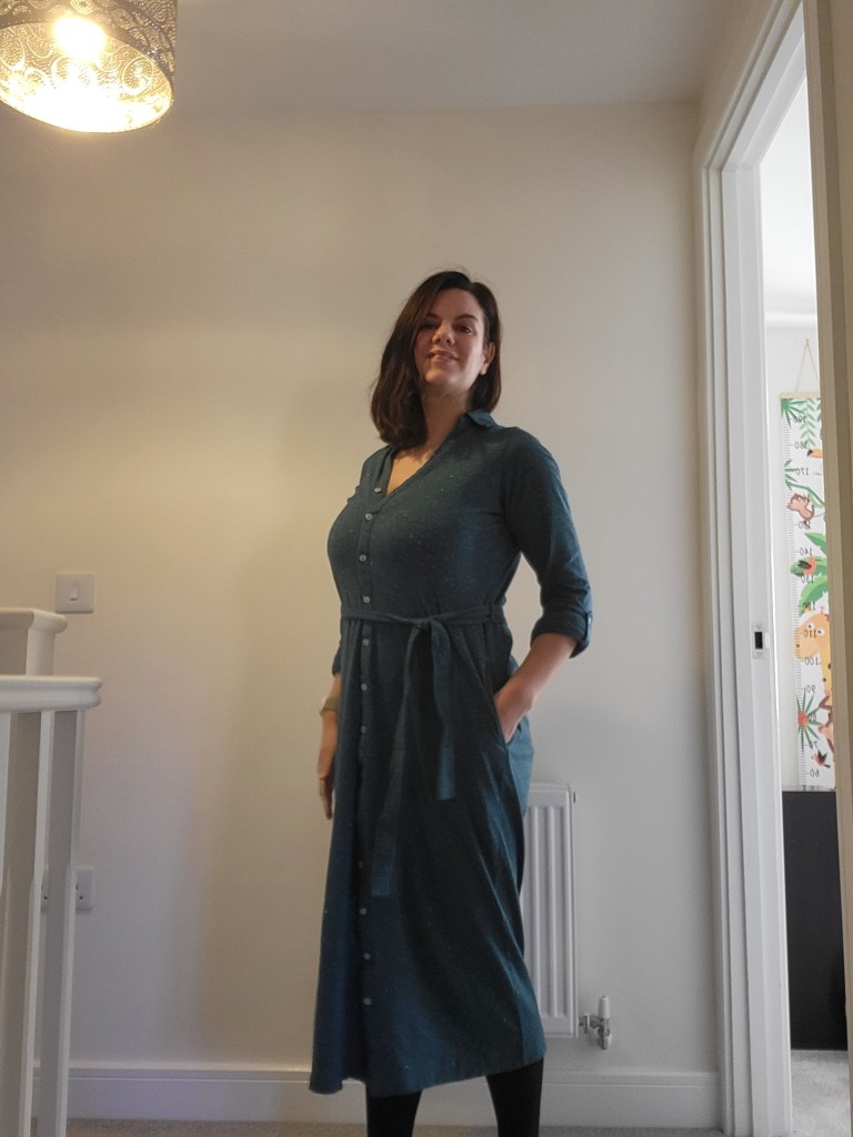 Woman standing up proud at home